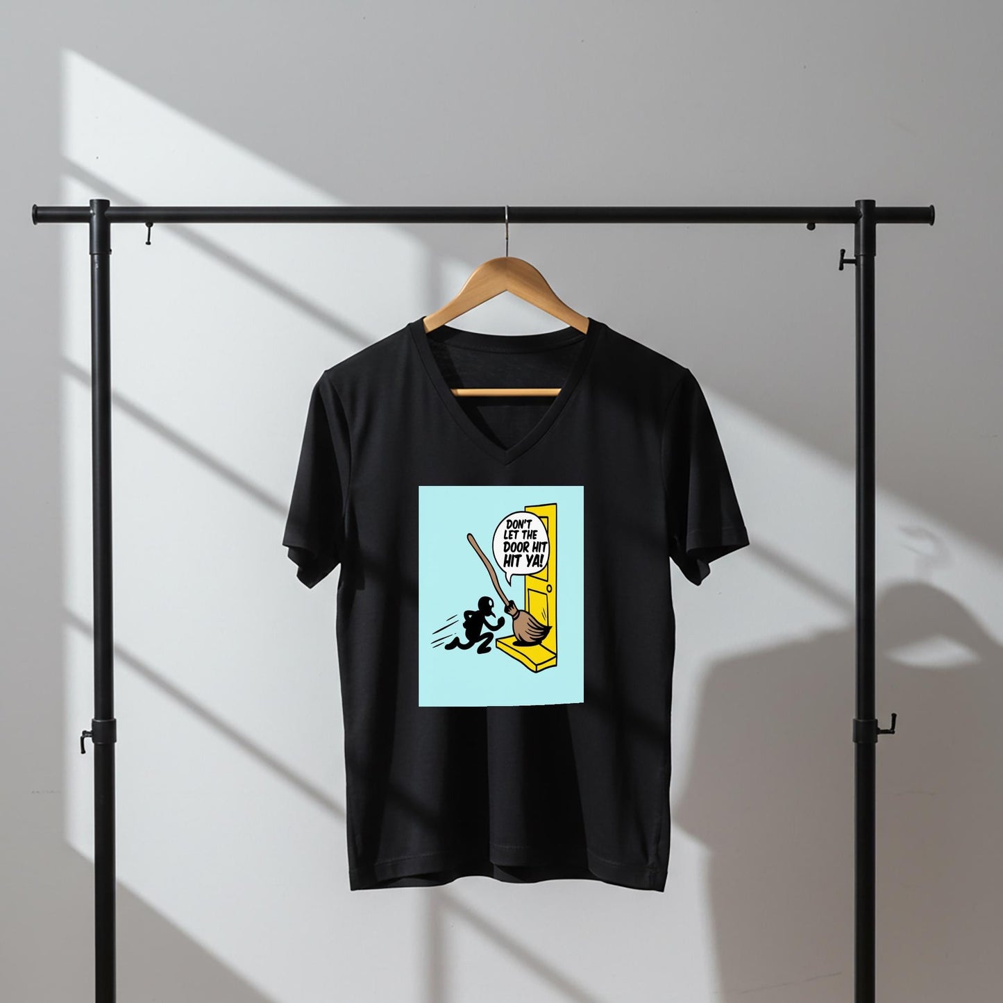 Unisex V-Neck Tee with Funny Broomstick Humor Design | Sarcastic Don't Let The Door Hit Ya Graphic T-Shirt | Witty Farewell Joke Gift Idea
