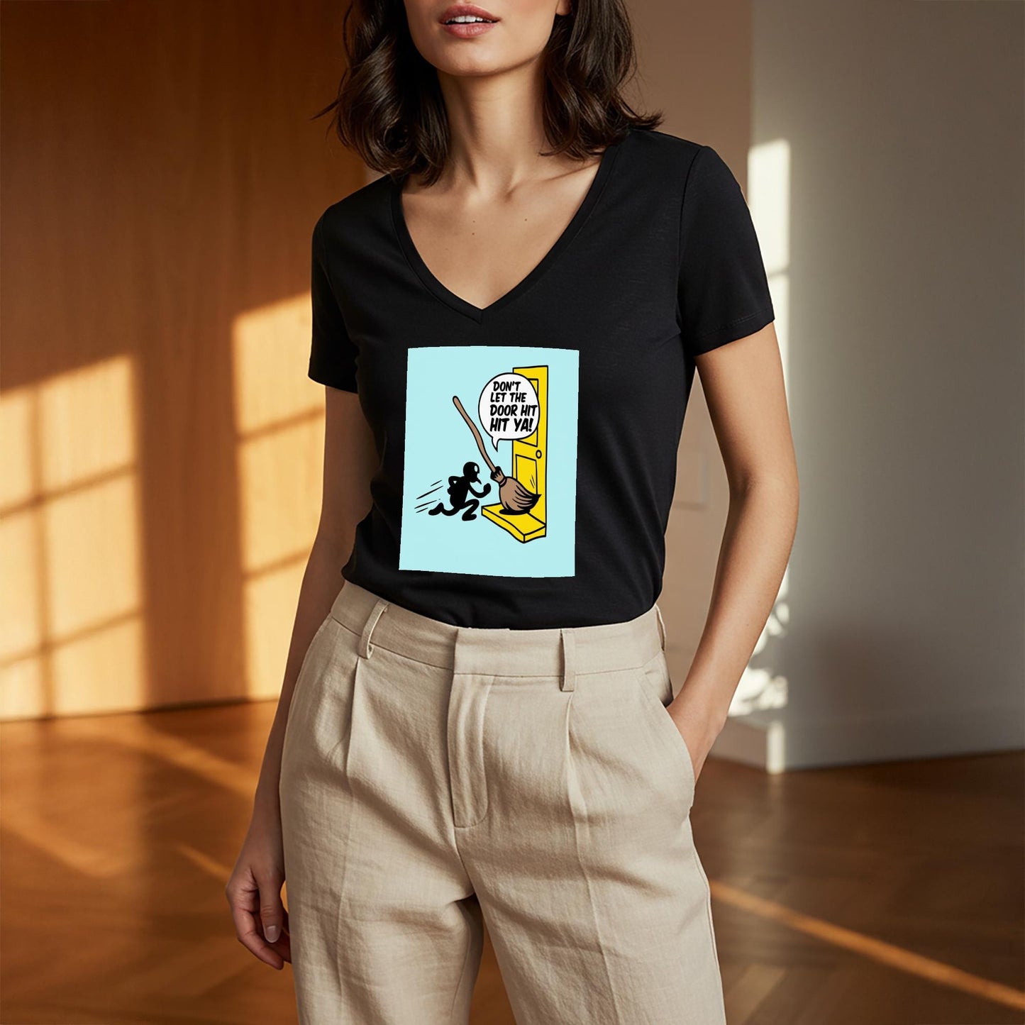 Unisex V-Neck Tee with Funny Broomstick Humor Design | Sarcastic Don't Let The Door Hit Ya Graphic T-Shirt | Witty Farewell Joke Gift Idea